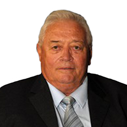 Photo de Francis Leclet, figure marquante du groupe AGS, reconnu pour son dévouement et ses contributions au développement des filiales en Afrique et dans les Caraïbes.